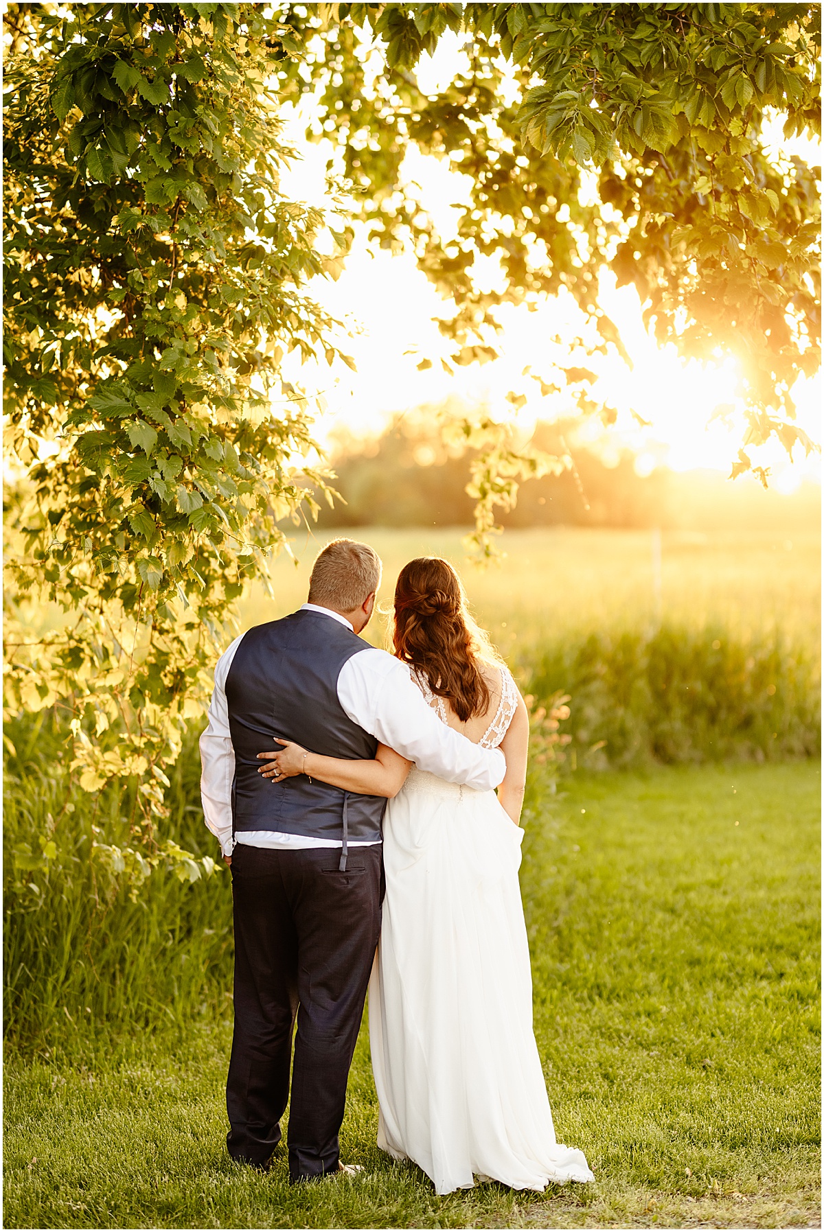 Husband and Wife Sunset Portraits on their wedding day