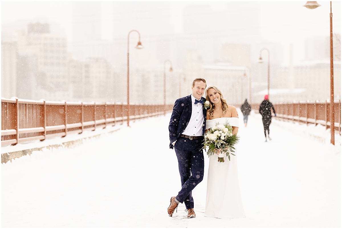 Bride and groom portraits outside at The View Minneapolis winter wedding